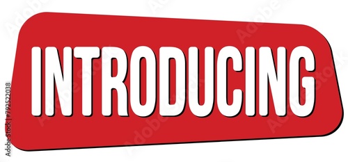 Tableau sur toile INTRODUCING text on red trapeze stamp sign.