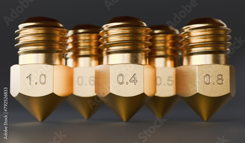 Many brass nozzles for 3D printer with different sizes. 3D rendered illustration. © vchalup