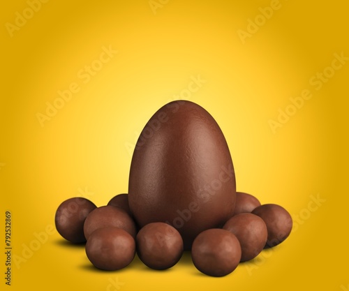 tasty sweet chocolate egg on desk
