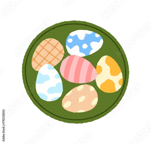 Painted and decorated Easter eggs. Spring holiday decoration on plate, tradit...