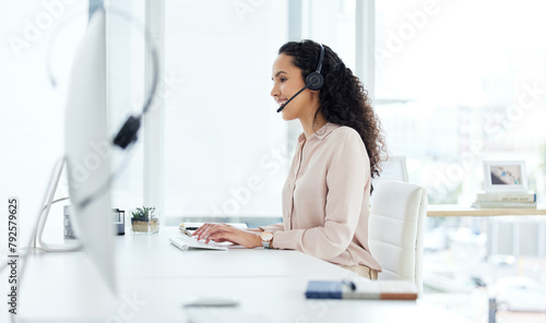 Call center, computer and happy consultant woman in telemarketing office for online assistance or help. Contact us, desk and microphone with sales agent or operator in workplace for customer support