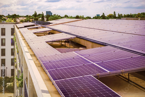 Solar Panels Apartment Building Roof . Solar Energy System of Modern High-rise Building. Solar Station on Roof Residential Multifamily Housing in Germany.