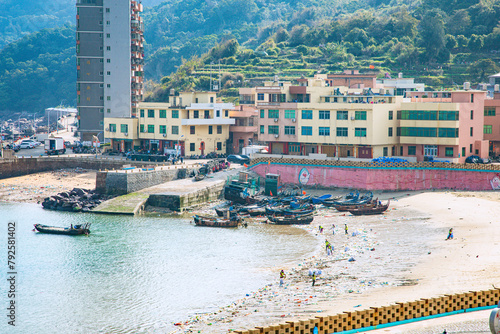 High angle view of the bay and fishing village on the top of the flag crown of Lianjiang County, Fujian Province photo