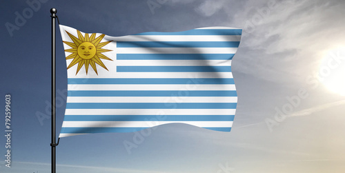 Uruguay national flag cloth fabric waving on beautiful grey sky Background.