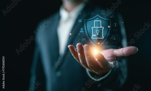 Cybersecurity and privacy concepts to protect data. Lock icon and internet network security technology. Businessman protecting personal data on smartphone, virtual screen interfaces. cyber security. © Looker_Studio