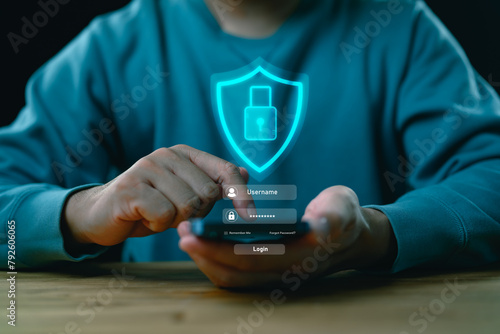 Cybersecurity and privacy concepts to protect data. Lock icon and internet network security technology. Businessman protecting personal data on smartphone, virtual screen interfaces. cyber security. © Looker_Studio