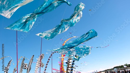 Cervia, ITaly : 04 21 2024 Festival degli Acquiloni a free kite event on beach with thousands of colorful kites in the sky. High quality 4k footage photo