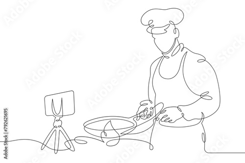 Cook is preparing food in the kitchen.Chef is in uniform.One continuous line.Blogger male character. Internet blogging, online broadcasting.Continuous line drawing.Line Art isolated white background.