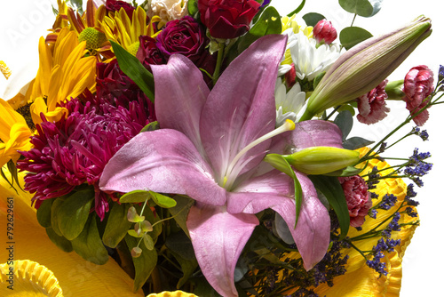 A bouquet of flowers, with different and colorful types of flowers. Background
