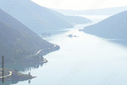 Verige Strait in Kotor Bay in the early morning - view from Gradine hill on the Adriatic sea, mountains and Perast islands in Montenegro photo