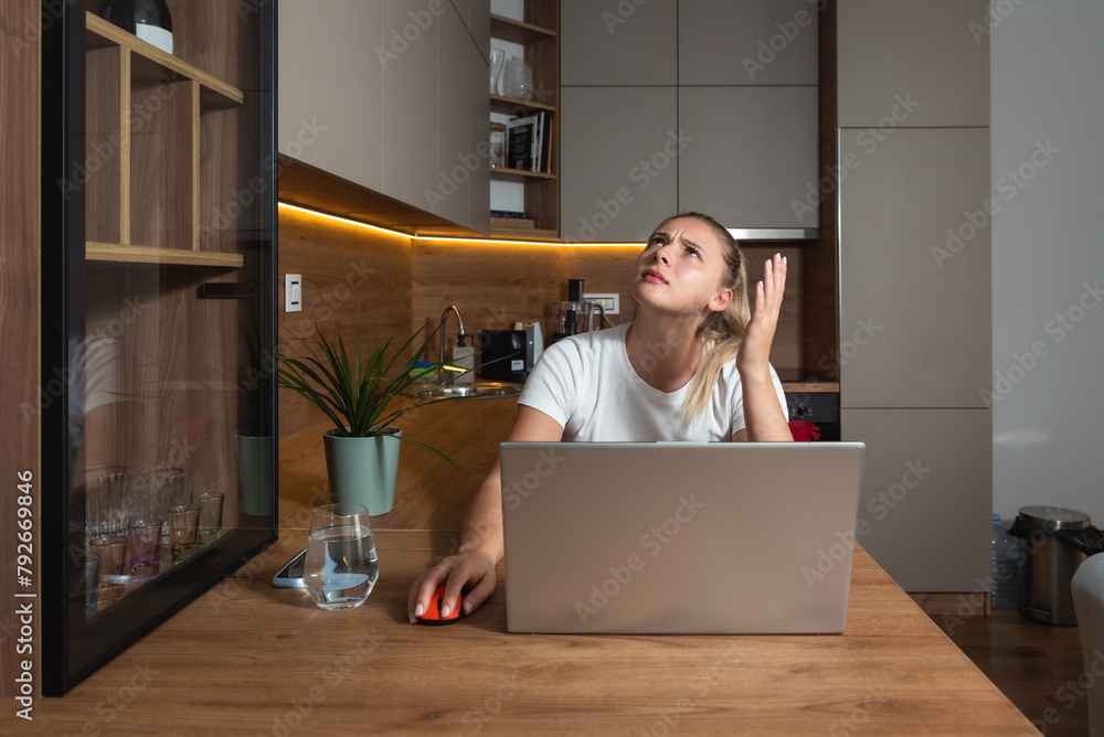 Young woman shouting trying to not to hear the loud noise from neighbor apartment in building while they renovate home and she cant work on laptop or study for school exam because of the noise Young woman shouting trying to not to hear the loud noise from neighbor apartment in building while they renovate home and she cant work on laptop or study for school exam because of the noise