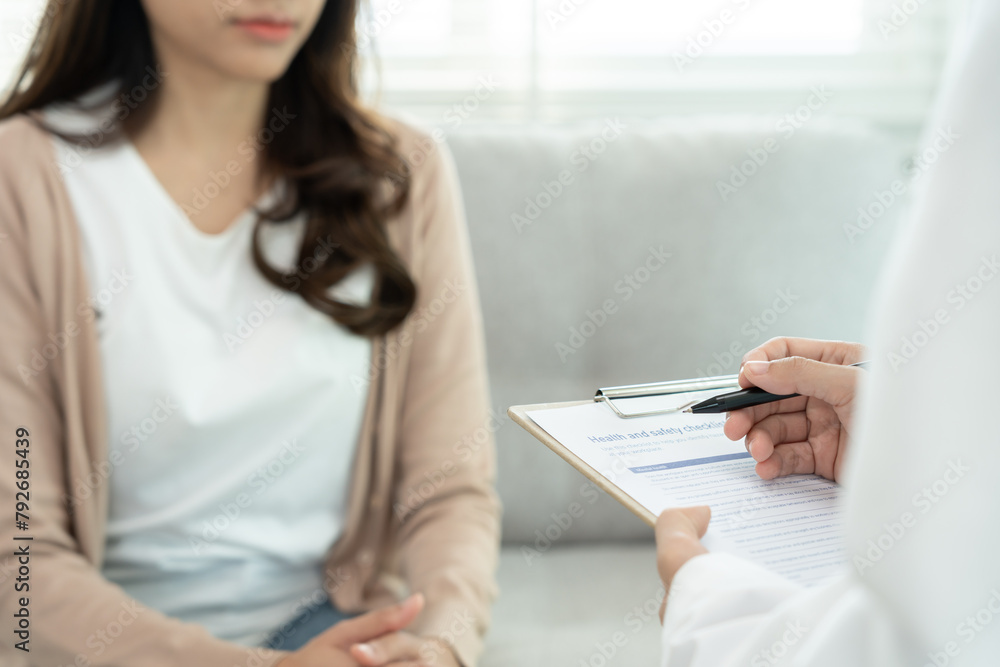 woman with mental health problems is consulting. psychiatrist is recording the patient's condition for treatment. encouragement, love and family problem, bipolar , depression patient, protect suicide woman with mental health problems is consulting. psychiatrist is recording the patient's condition for treatment. encouragement, love and family problem, bipolar , depression patient, protect suicide