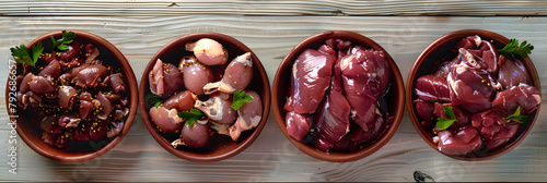 Raw chicken giblets raw poultry meat set : liver, stomach and heart photo