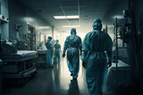Medical workers walk through the hospital corridor