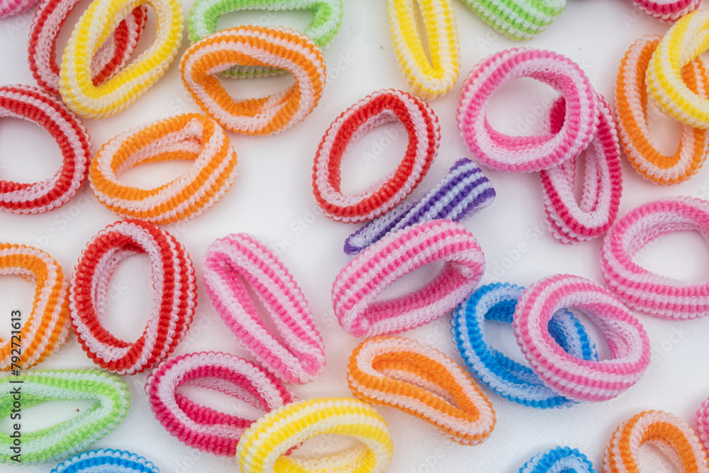 Heap of various hair ties. Multicolored elastics Heap of various hair ties. Multicolored elastics