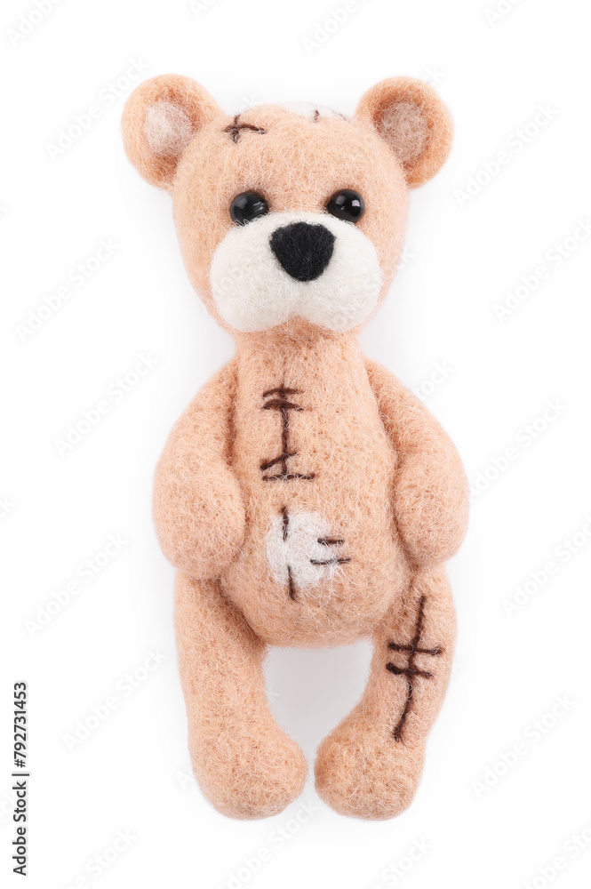 Needle felted bear isolated on white, top view Needle felted bear isolated on white, top view