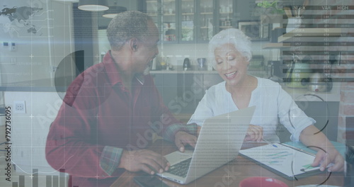 Image of data processing over african american senior couple calculating finance at home