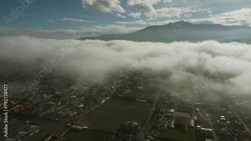 Machachi City lies in the Andes valley near Quito and is the starting point for visiting the surrounding mountains and the Pasochoa volcano, Ecuador. Aerial shot
