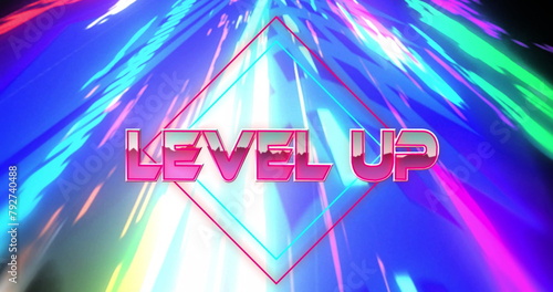 Image of level up text over colourful lights on black background