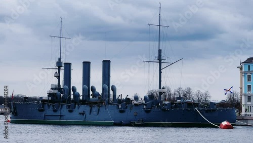 St. PETERSBURG, RUSSIA - April 20, 2024: The Aurora Cruiser Museum on the Neva River on a 20th-century warship. View of the cruiser Aurora, a historical warship, now a war memorial museum. 4К photo