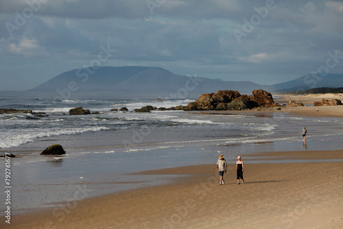 Swimming and walking at the Lighthouse Beach in Port Macquarie in New South Wales, Australia, Pacific photo