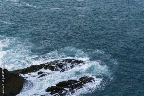 waves on the rocks on windy day storm on the sea 