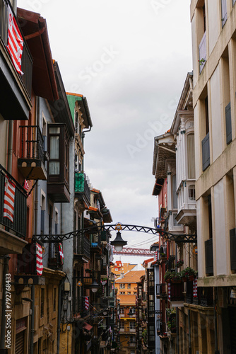 street in the city with colorful detailed houses very close  photo