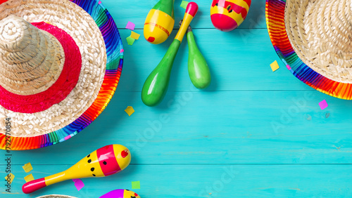 Cinco de Mayo holiday background made from maracas cactus and hat on yellow background Generative AI © Fuji