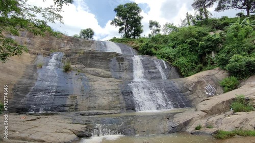 At the Foot of a Small Waterfall photo