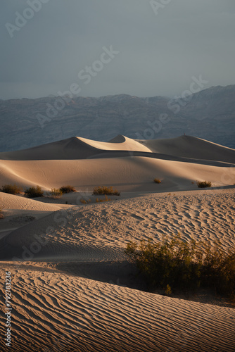 Beatiful sunrise in the Mesquite Sand Dunes, in the Death Valley National Park, California photo