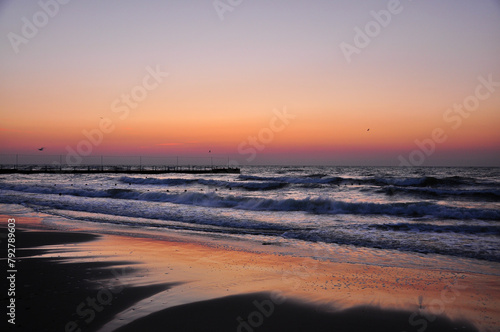 Sunset at the Imperial Beach. Cloudy sunset and pier in San Diego. photo