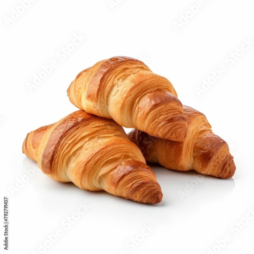 Freshly baked croissants with crispy texture, isolated on a white background, suitable for bakery and gourmet topics