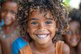 A child with a wide grin and sparkling eyes, bursting with energy and enthusiasm for life