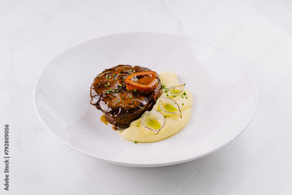 Gourmet steak with mashed potatoes on elegant plate