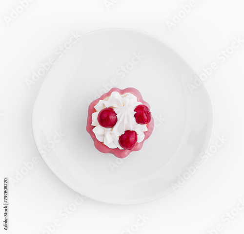 Top view of raspberry dessert on white plate