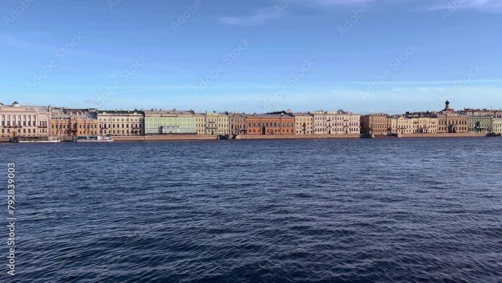 St. Petersburg, Russia - April 20, 2024. The University embankment of the Neva River. View of the sights of the city from the palace bridge. Panoramic view of the Neva River and the Palace embankment. St. Petersburg, Russia - April 20, 2024. The University embankment of the Neva River. View of the sights of the city from the palace bridge. Panoramic view of the Neva River and the Palace embankment.
