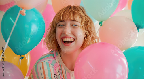 a girl celebrating her birthday surrounded by balloons, happy and excited, with blonde hair and bangs © Kien