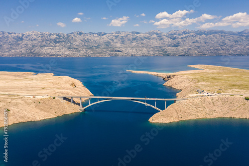 Pag, Croatia: Aerial view of the bridge linking the Pag island to the Dalmatian coast in mainland Croatia, near Zadar on a sunny summer day.
