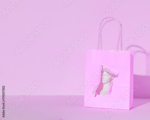 Elegant retail shopping bag mockup, pink monochrome aesthetic.
