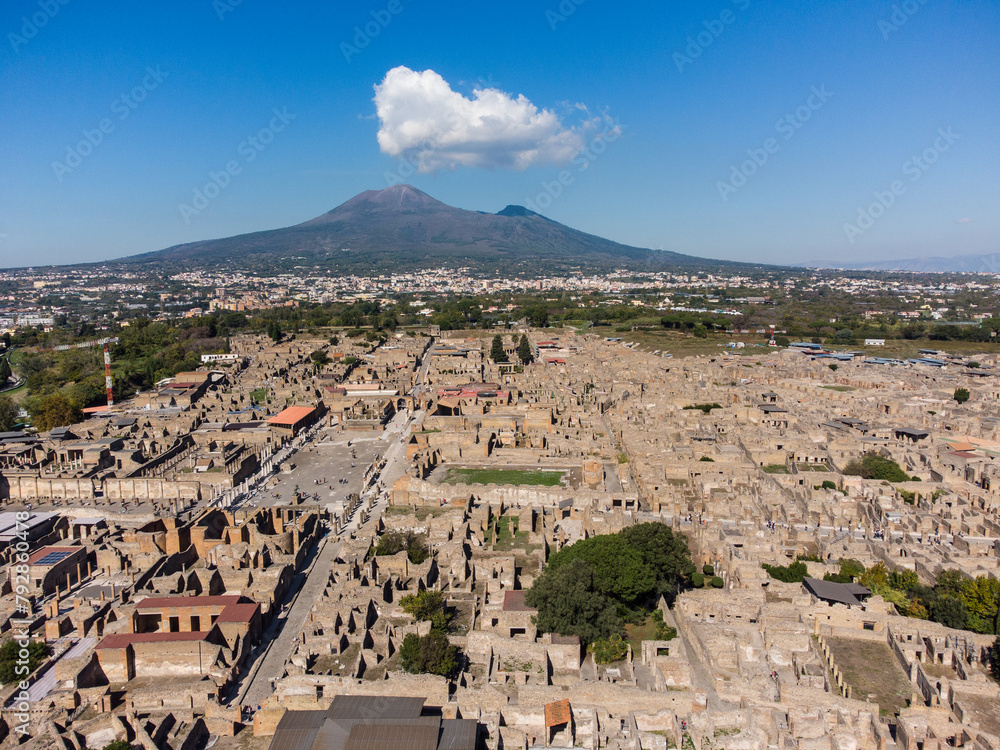 Pompei, Itay: Aerial view of the famous Pompeii archaeological old city by the Vesuve volcano in Napoly, or Naples, in Italy on a sunny day.
