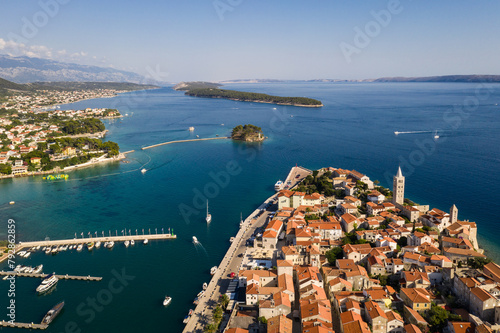 Obraz na płótnie Rab, Croatia: Aerial drone view of the famous Rab medieval old town by the Adriatic sea in Croatia on a sunny summer day w salonie
