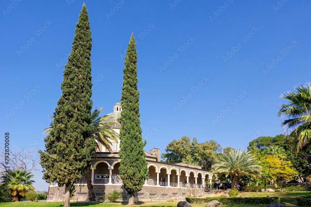 The Church of the Beatitudes near lake Tiberias in Israel is a Catholic church of the Italian Franciscan convent . Magnificent monastery surrounded by columns and slender. Biblical and pilgrimage site