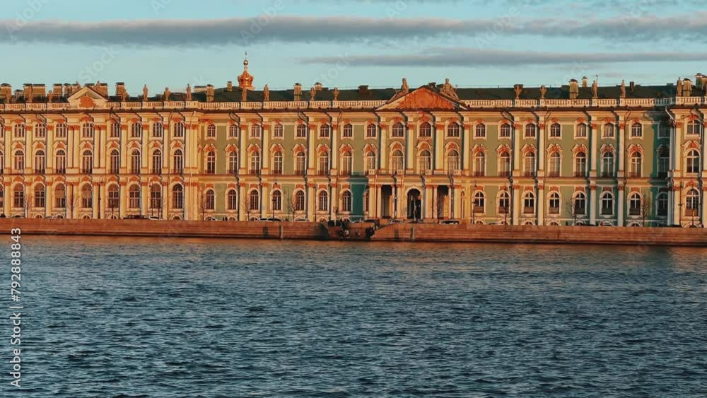 St. Petersburg, Russia - April 20, 2024. The University embankment of the Neva River. View of the sights of the city from the palace bridge. Panoramic view of the Neva River and the Palace embankment. St. Petersburg, Russia - April 20, 2024. The University embankment of the Neva River. View of the sights of the city from the palace bridge. Panoramic view of the Neva River and the Palace embankment.