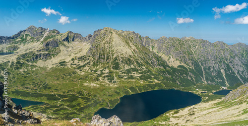 Dolina Pieciu Stawow Polskich with lakes nad peaks above from Szpiglasowy Wierch in High Tatras mountains in Poland photo