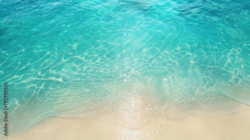 Crystal Clear Tropical Water Shimmering on Sandy Beach