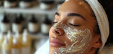 A woman enjoying a hydrating facial treatment, her skin being pampered with luxurious creams and serums