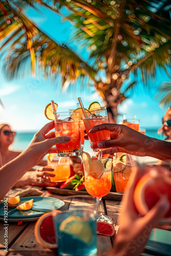 friends drinking cocktails on the beach. Selective focus. photo