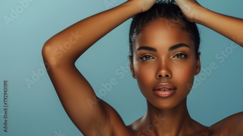 Portrait, skincare, ebony woman, cosmetics, luxury, and dermatology on blue studio background. Face, African person or model with lip gloss, treatment or glow with aesthetic, shine and cosmetics