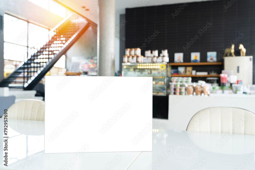 Fototapeta premium Mock up Menu frame on Table in Bar restaurant, clipping path.
