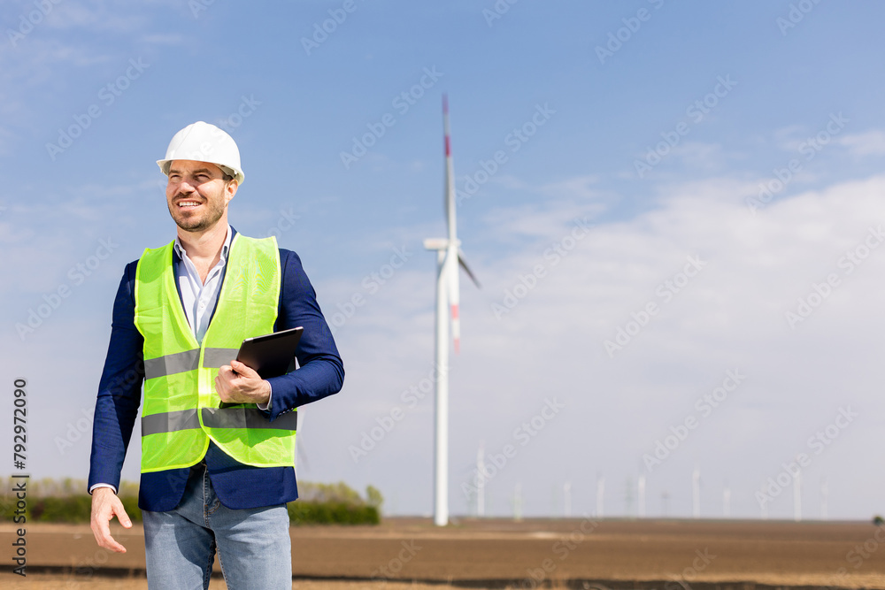Smiling Engineer With Tablet Inspecting Wind Turbines On A Sunny Day. Generative AI Smiling Engineer With Tablet Inspecting Wind Turbines On A Sunny Day. Generative AI